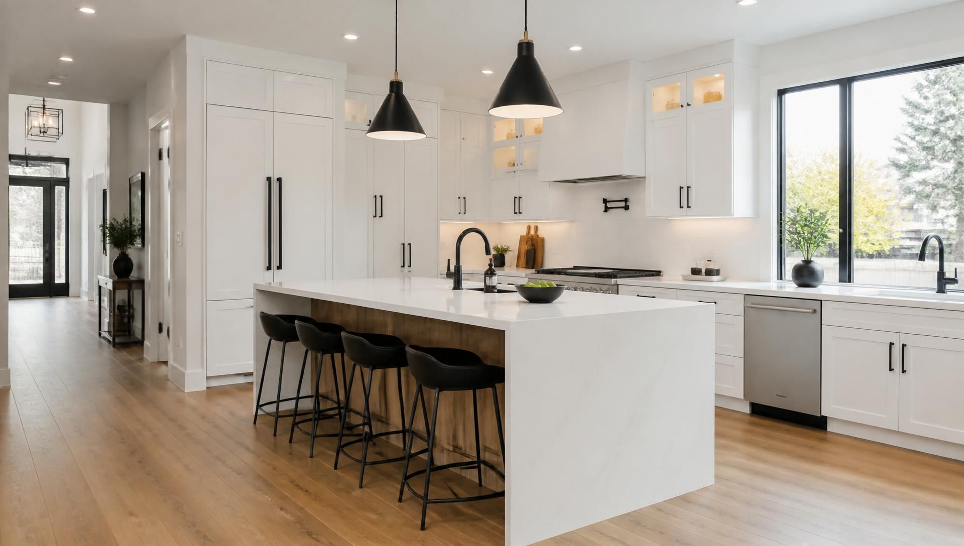 Renovated open-concept kitchen with quartz island in a Brampton home
